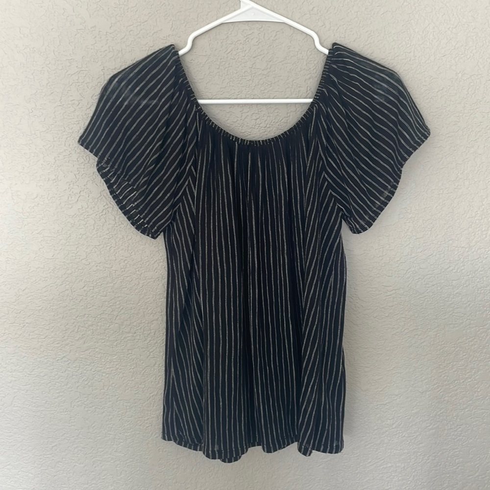Off-the-shoulder blouse.